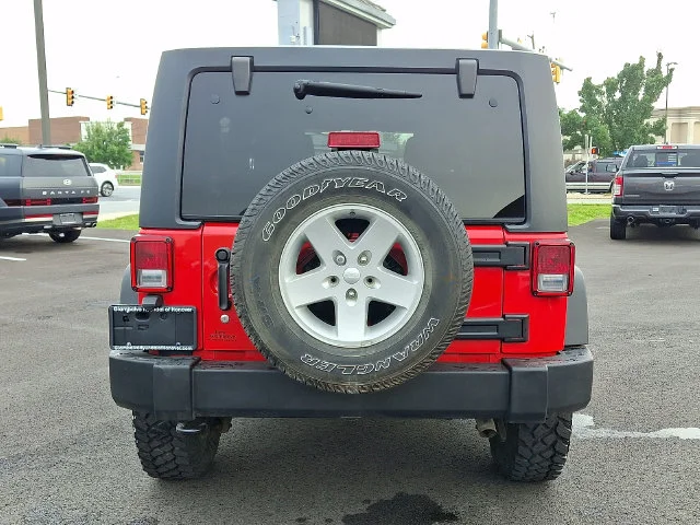 Used 2016 Red Jeep Unlimited Sport image 5