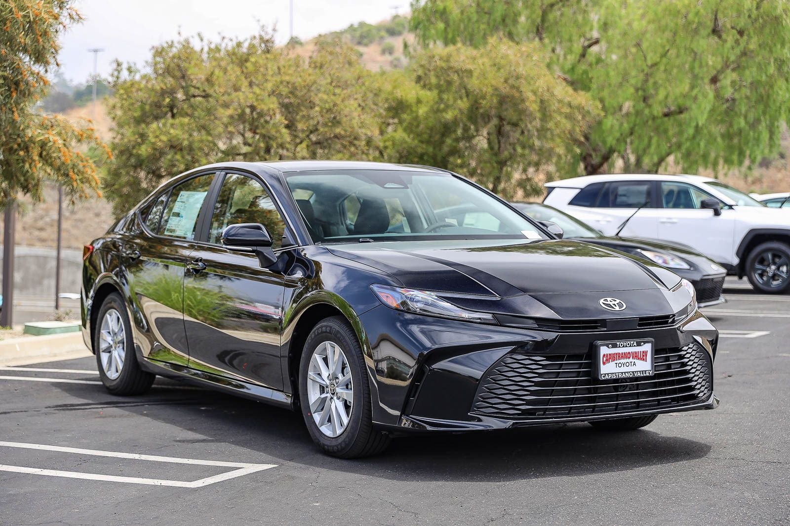 New 2026 Midnight Black Metallic Toyota  LE image 3