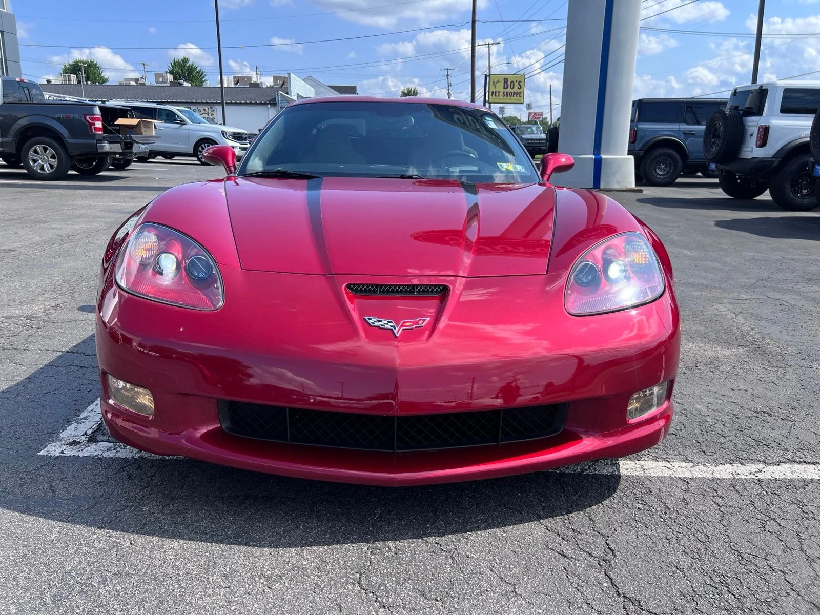 Used 2012 Crystal Red Tintcoat Chevrolet Grand Sport image 2