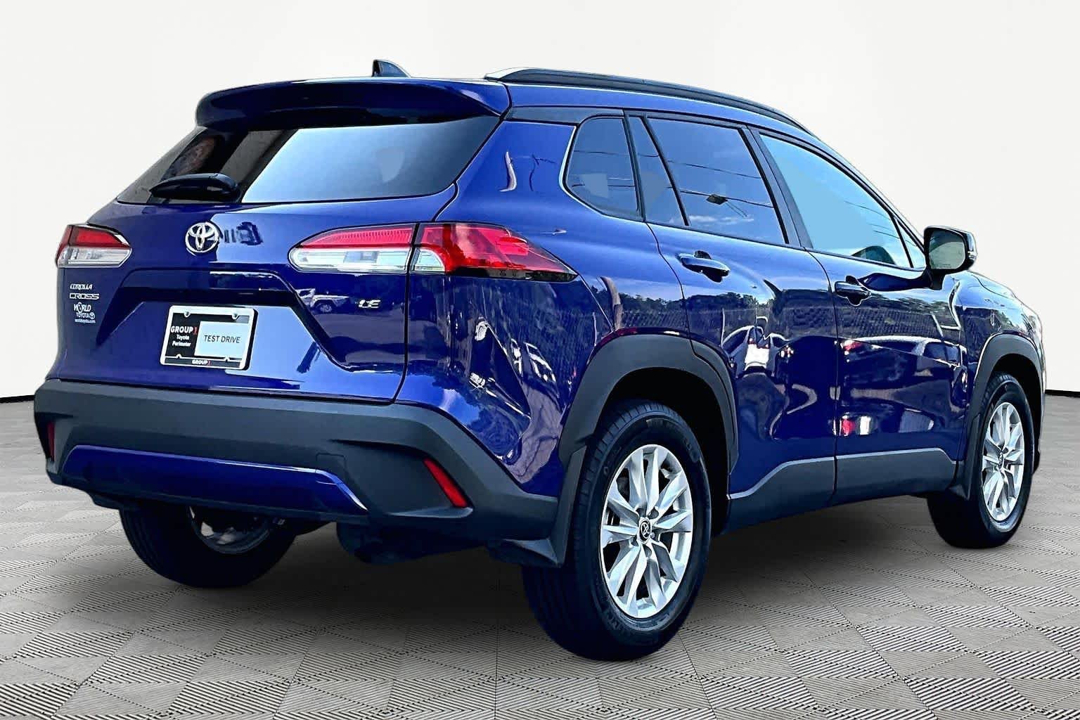 Used 2025 Blue Crush Metallic Toyota LE image 13