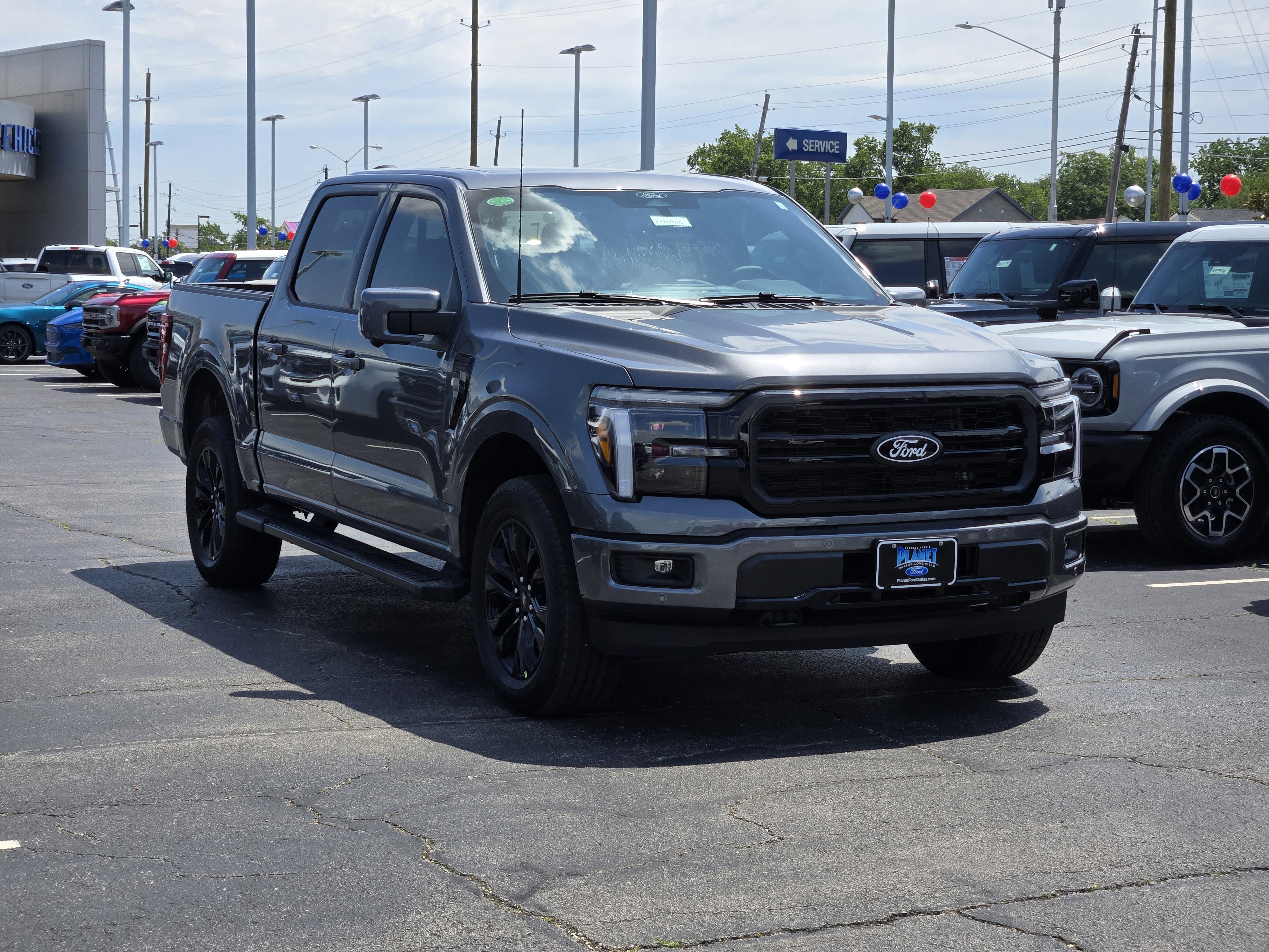 New 2026 Carbonized Gray Metallic Ford Lariat image 2