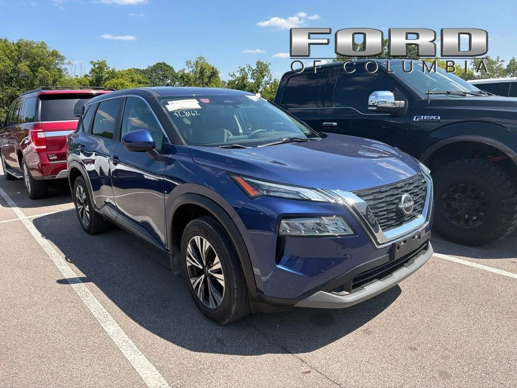 Used 2023 Blue Nissan SV image 1