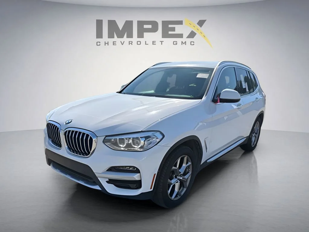 Used 2021 White BMW xDrive30i image 1