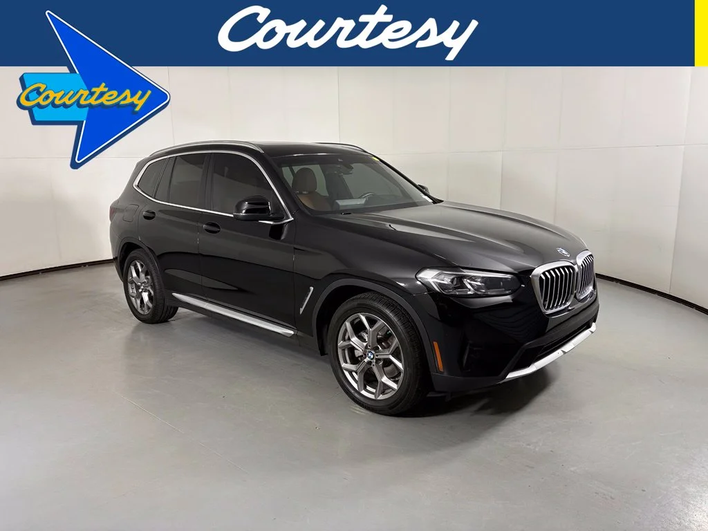 Used 2022 Black BMW sDrive30i image 1