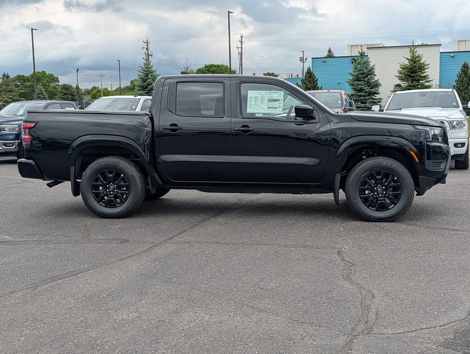 New 2026 Super Black Nissan Crew Cab SV image 8