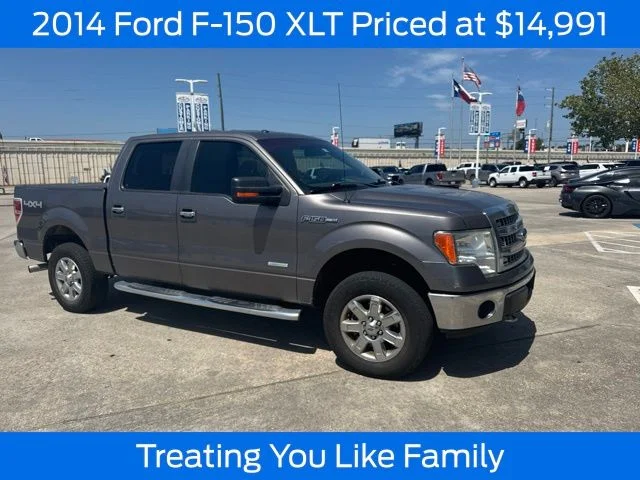 Used 2014 Sterling Gray Metallic Ford XLT image 1