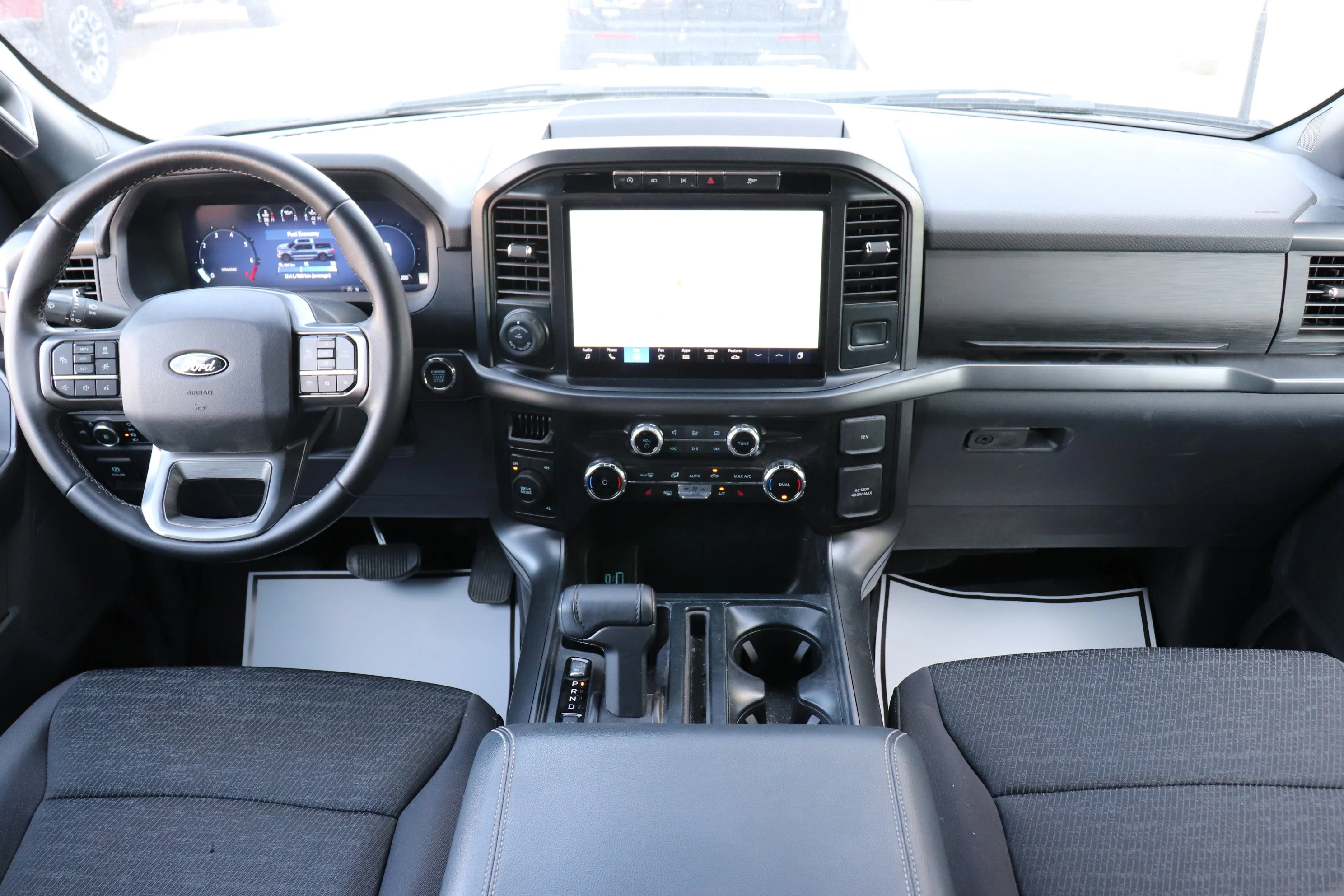 Used 2024 Silver Ford XLT 4WD SuperCrew 5.5