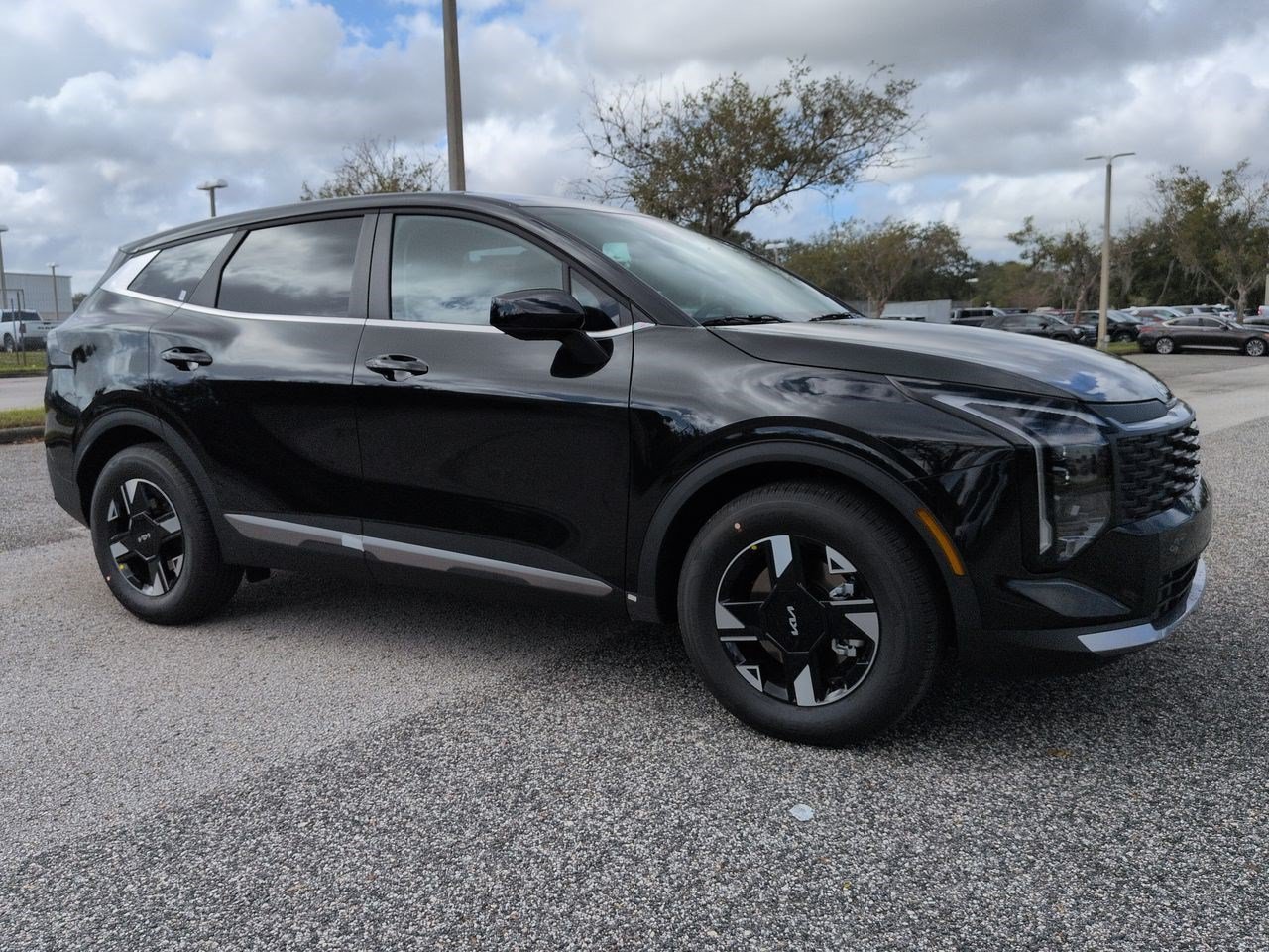 New 2027 Fusion Black Kia LX image 1