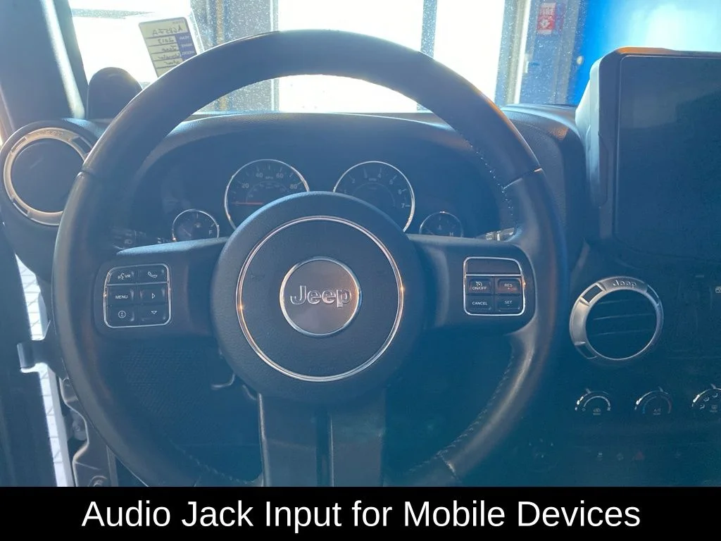 Used 2013 Silver Jeep Sahara image 6