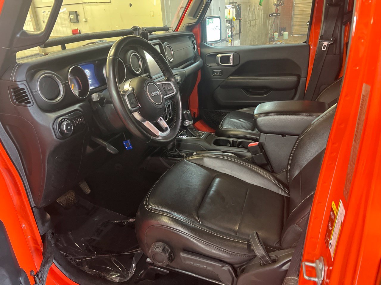 Used 2020 Orange Jeep Unlimited Sahara image 8