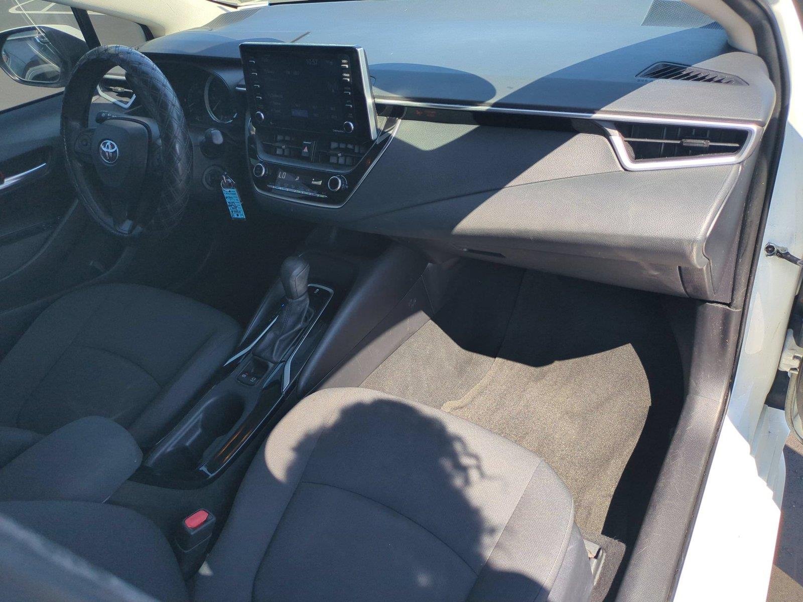 Used 2021 Super White Toyota LE image 35
