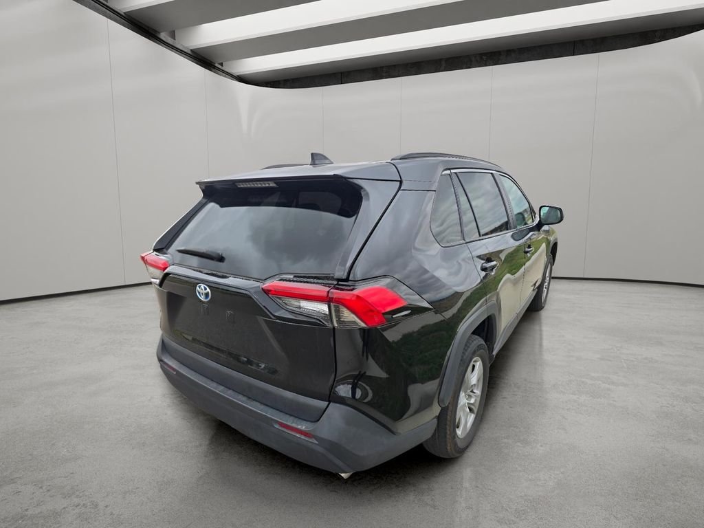 Used 2022 Midnight Black Metallic Toyota Hybrid LE image 5