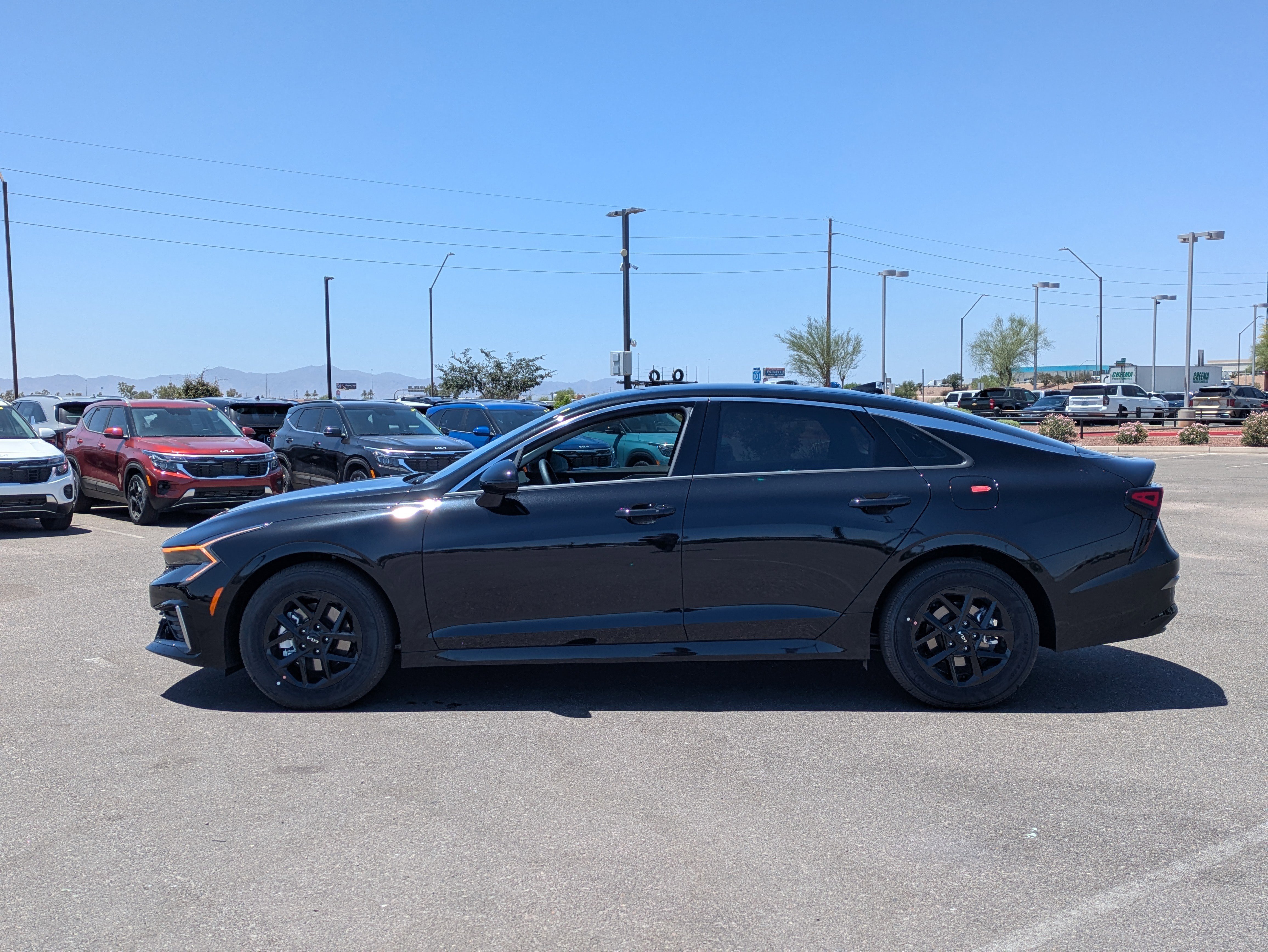 New 2026 Aurora Black Pearl Kia LXS FWD image 2