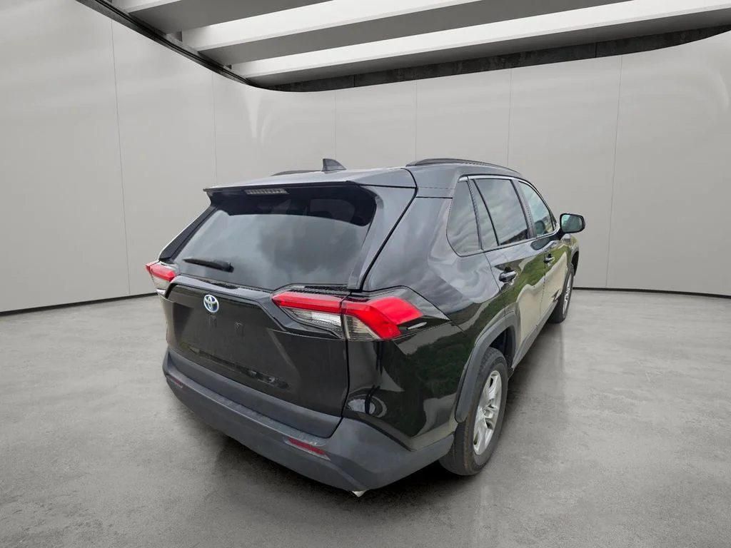 Used 2022 Midnight Black Metallic Toyota Hybrid LE image 5
