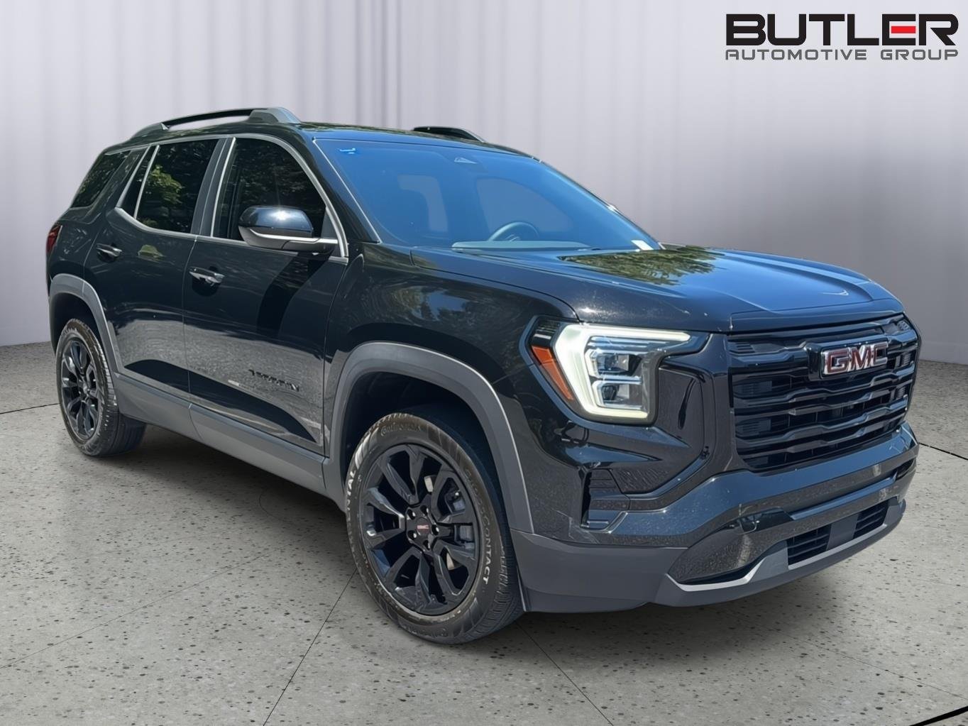 Used 2025 Ebony Twilight Metallic GMC AWD Elevation image 3