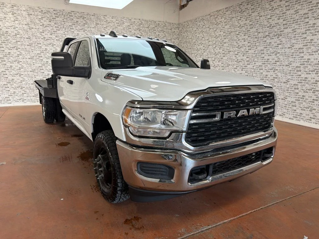 Used 2024 Bright White Clearcoat Ram SLT image 1