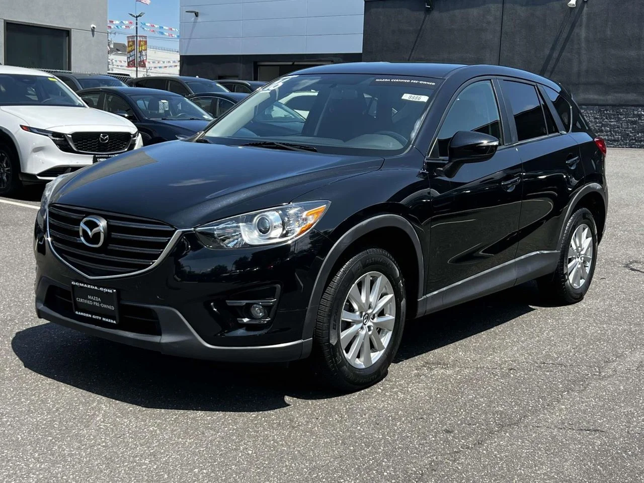 Used 2016 Mazda CX-5 Touring with VIN JM3KE4CY7G0897483 for sale in Glen Cove, NY