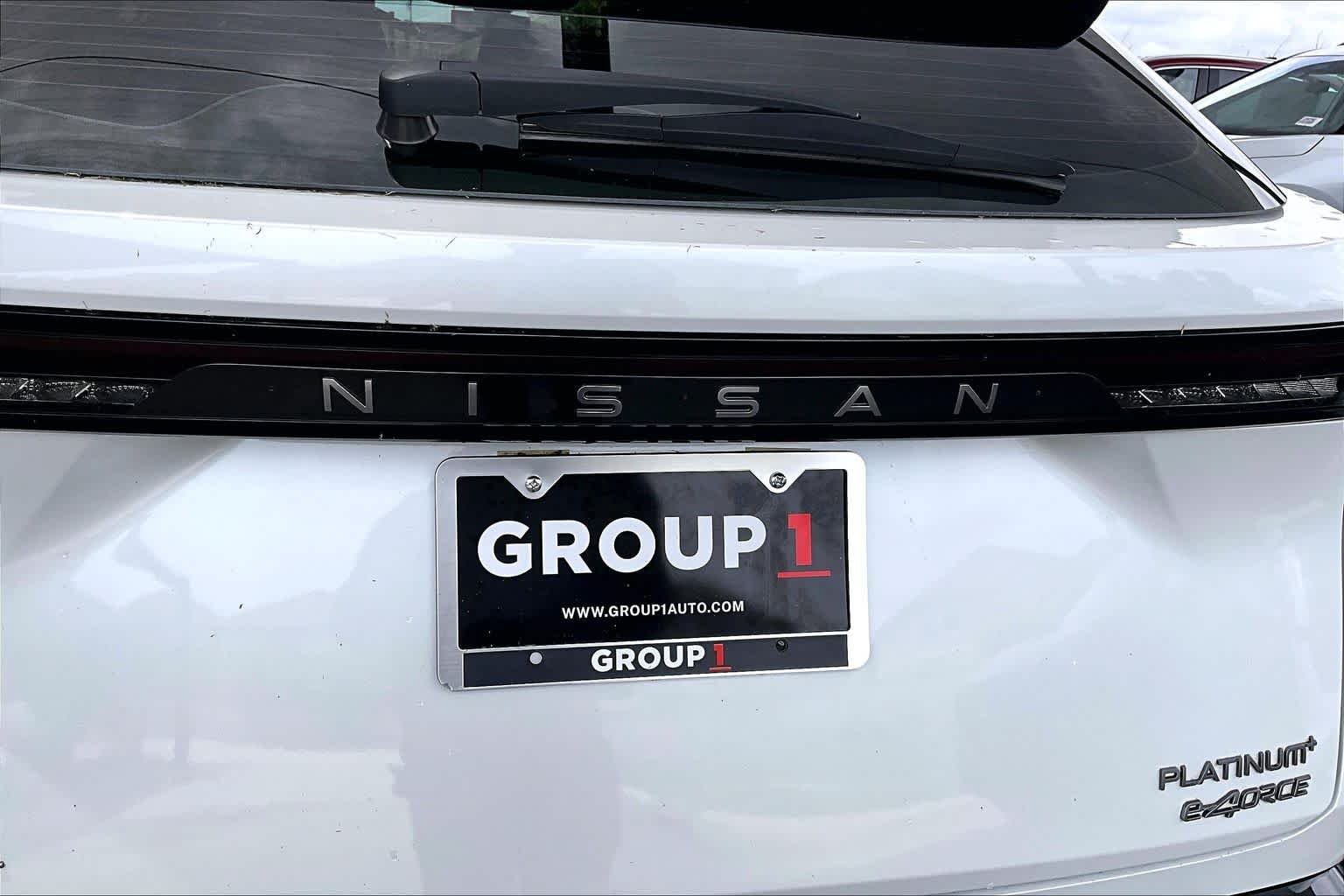 Used 2023 Everest White Pearl Tricoat/Black Diamond Pearl Nissan PLATINUM+ image 30