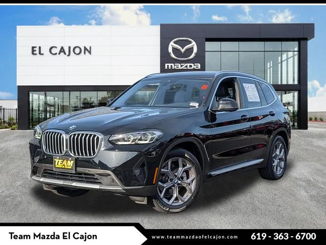 Used 2023 Black BMW sDrive30i image 1