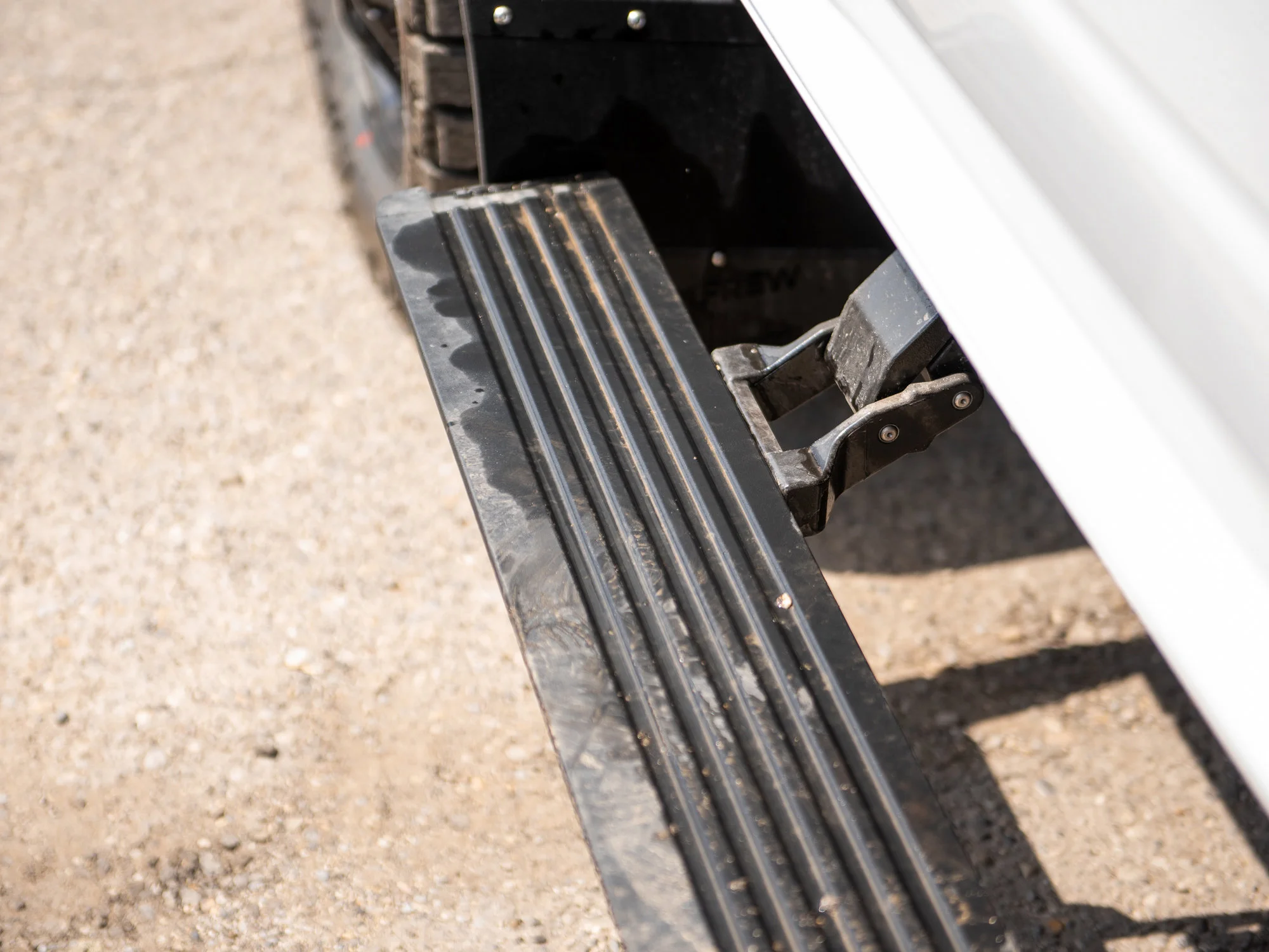 New 2026 White RAM Laramie* Mega Cab, 2 Inch Lift, 35 Inch Tires, Trigger Industries Bumper image 6