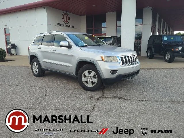 Used 2011 Silver Jeep Laredo image 1