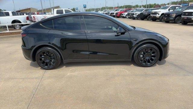 Used 2023 Tesla Model Y Long Range with VIN 7SAYGDEEXPA139137 for sale in Longview, TX
