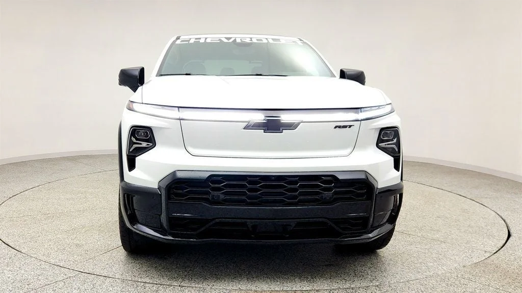 Used 2025 Summit White Chevrolet e4WD Crew Cab Max Range RST w/ Hard Folding Truck Bed Cover image 2
