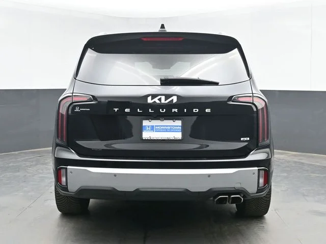 Used 2024 Ebony Black Kia EX image 9