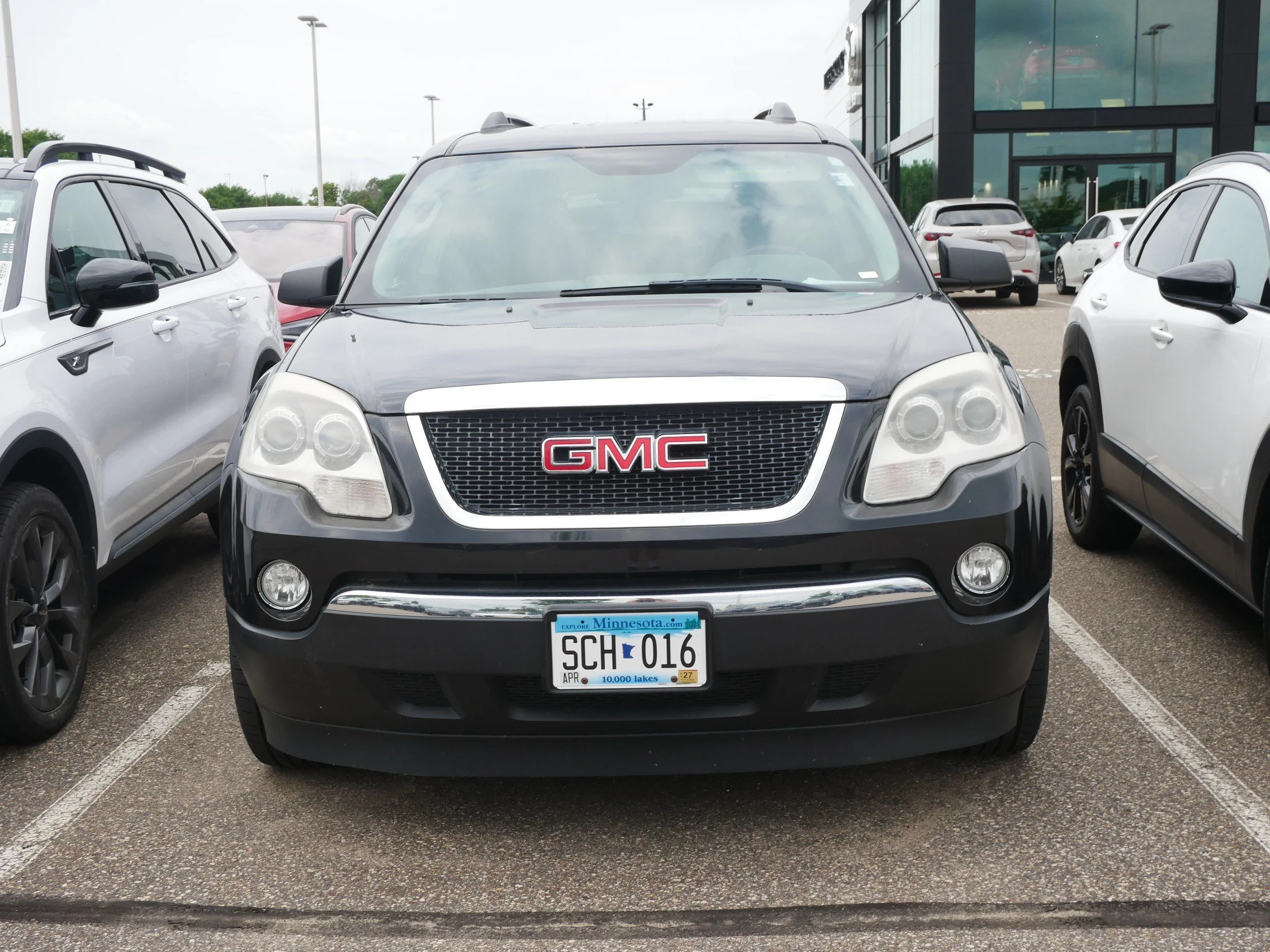 Used 2012 GMC Acadia SLE with VIN 1GKKVPED0CJ204511 for sale in Brooklyn Center, Minnesota