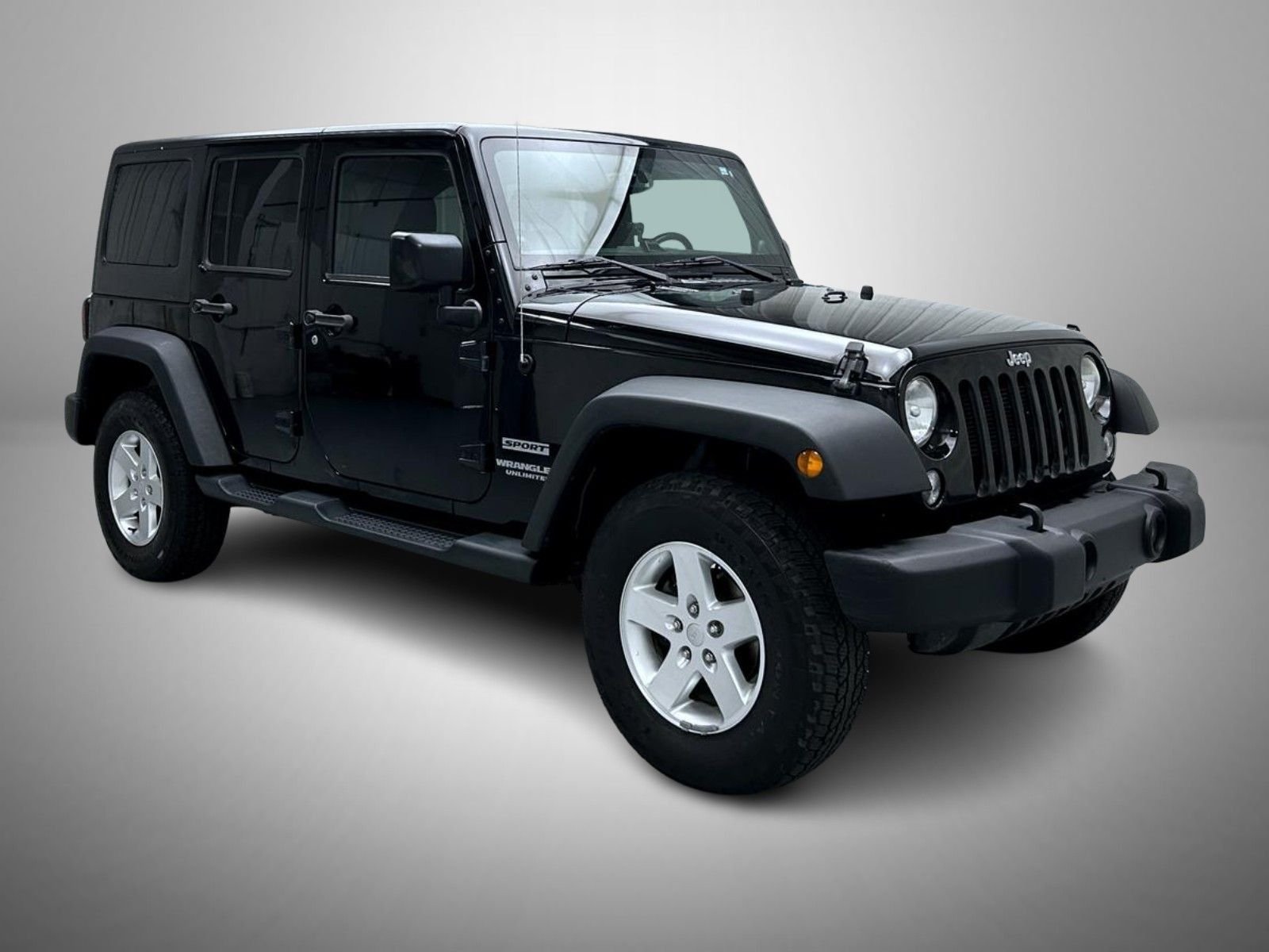 Used 2014 Black Jeep Unlimited Sport image 3