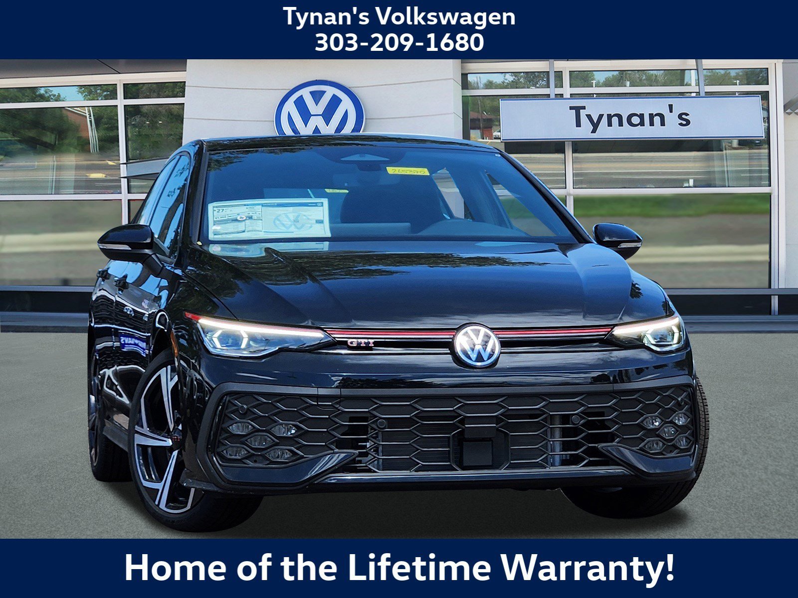 New 2026 Black Volkswagen SE image 1