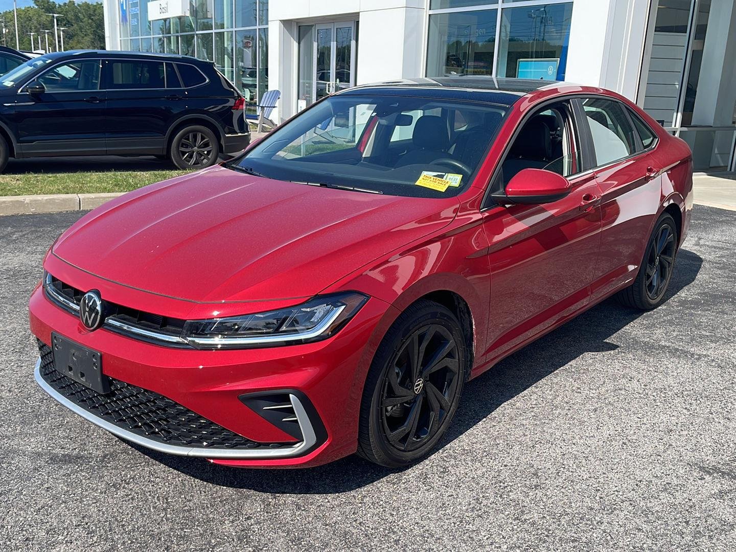 Certified Used 2026 Kings Red Metallic Volkswagen SE image 3
