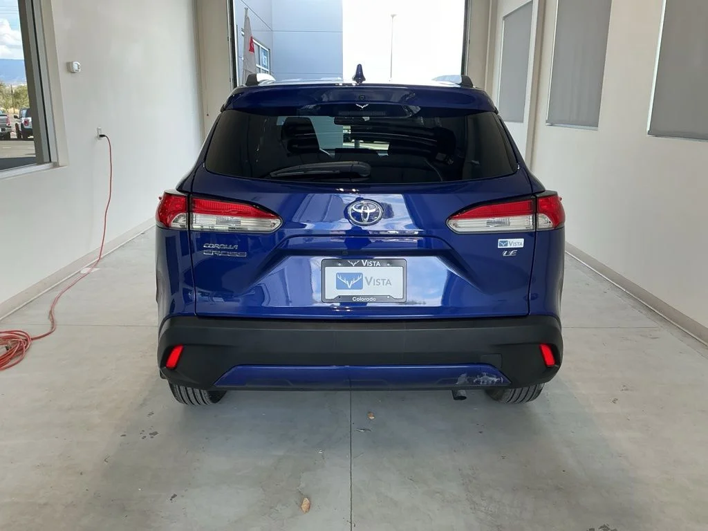 Used 2023 Blue Crush Metallic Toyota LE image 5