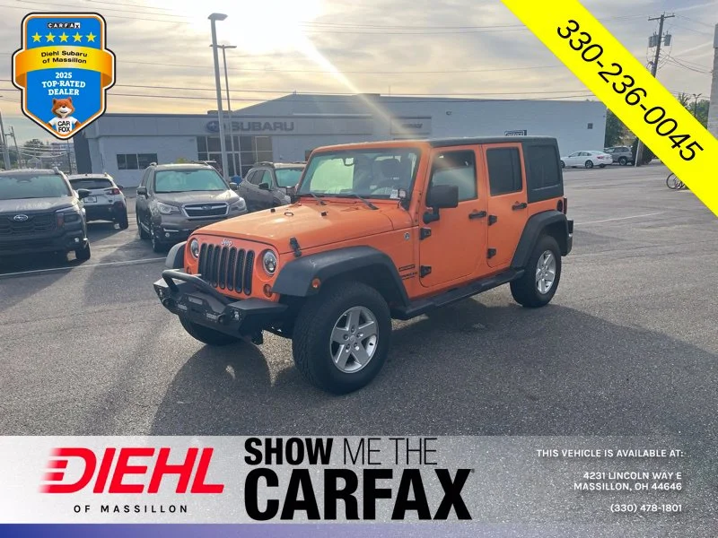 Used 2013 Orange Jeep Unlimited Sport image 5