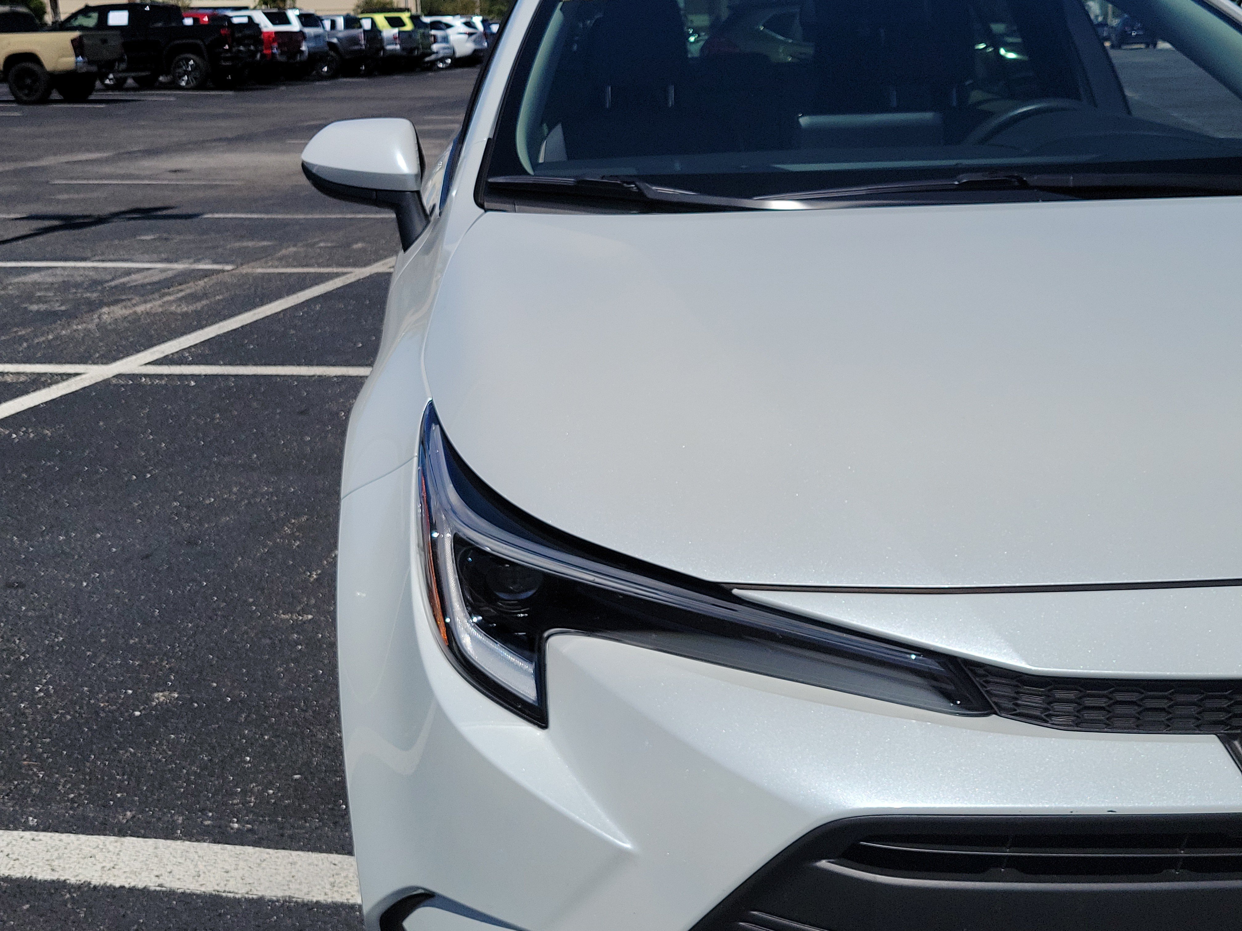 Used 2024 Pearl Toyota LE image 6