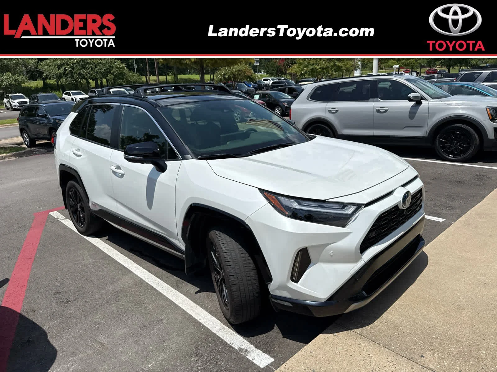 Used 2024 Wind Chill Pearl/Midnight Black Metallic Toyota Hybrid XSE image 1