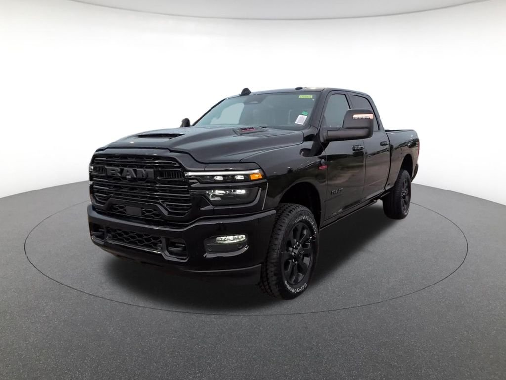 New 2026 Diamond Black Crystal Pearl-Coat Exterior Paint RAM Laramie image 2