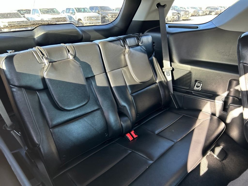 Used 2024 White Metallic Ford Limited image 43