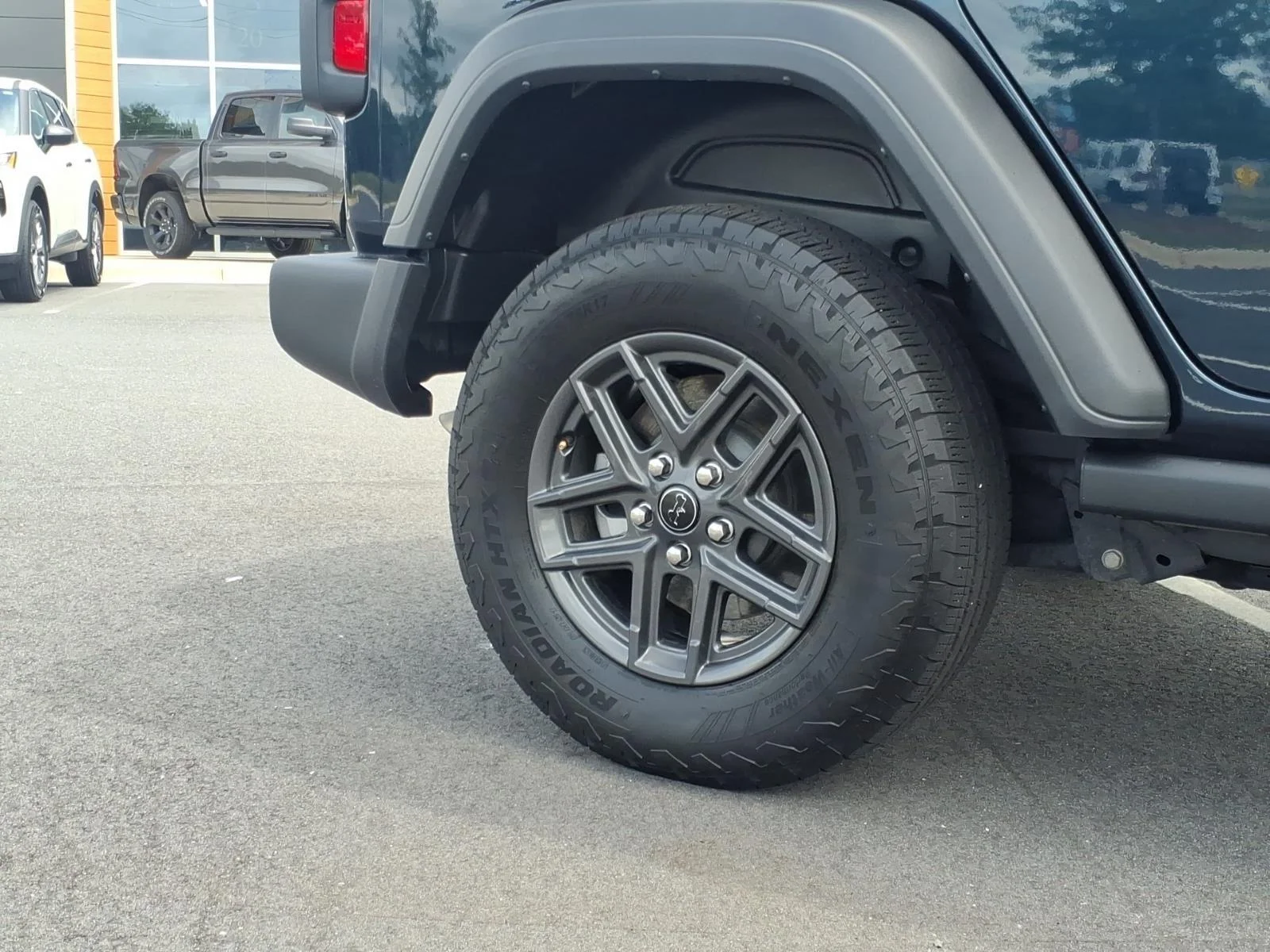 Used 2025 Fathom Blue Pearlcoat Jeep Sport S image 10