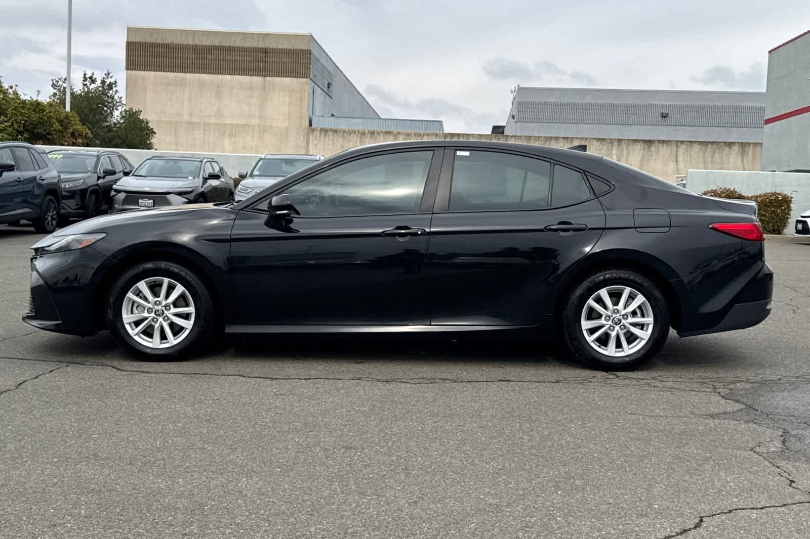 Used 2025 Midnight Black Metallic Toyota LE image 9