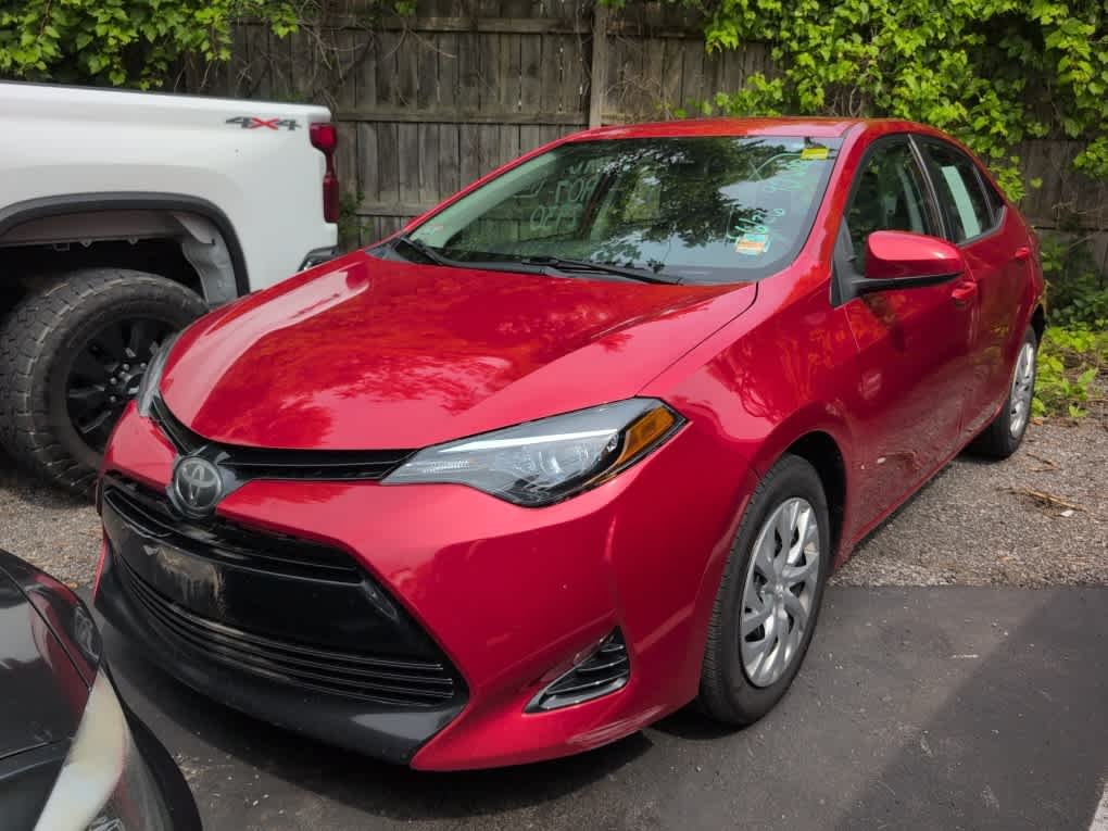 Used 2018 Barcelona Red Metallic Toyota LE image 2