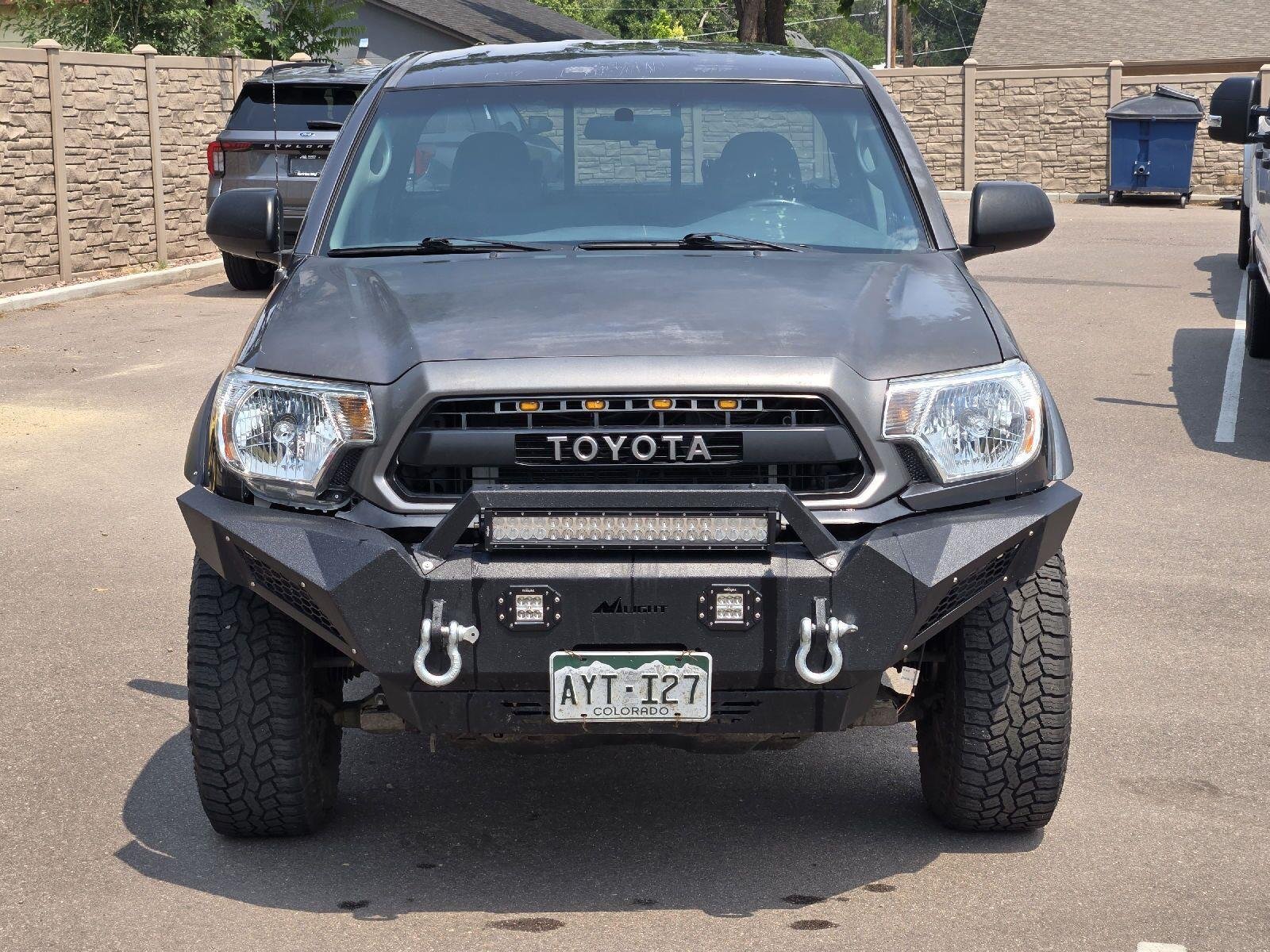 Used 2014 Toyota Tacoma Base with VIN 5TFUX4EN1EX028414 for sale in Canon City, CO
