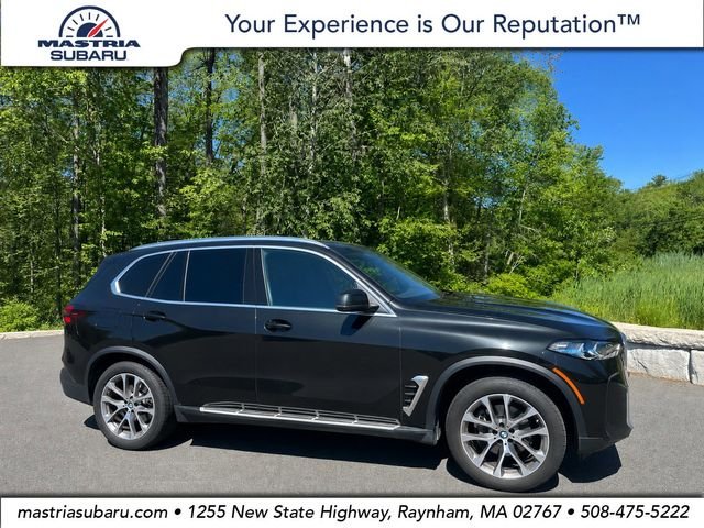 Used 2026 Black Sapphire Metallic BMW xDrive40i image 1
