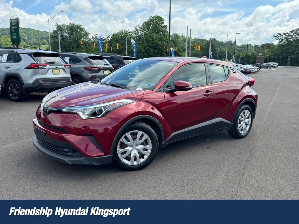 Used 2019 Red Toyota LE image 1
