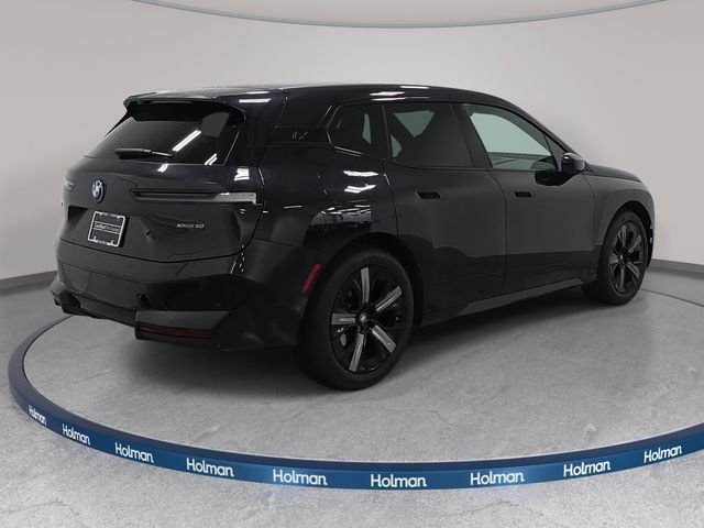 Used 2024 Black Sapphire Metallic BMW xDrive50 image 6