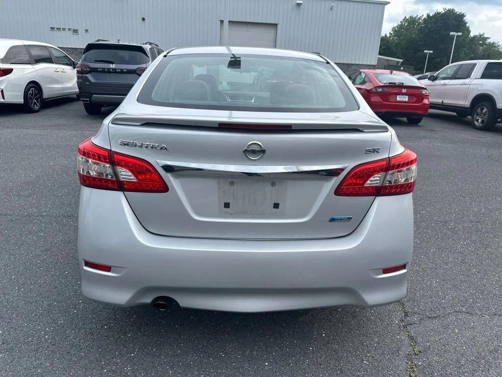 Used 2013 Brilliant Silver Nissan SR image 4