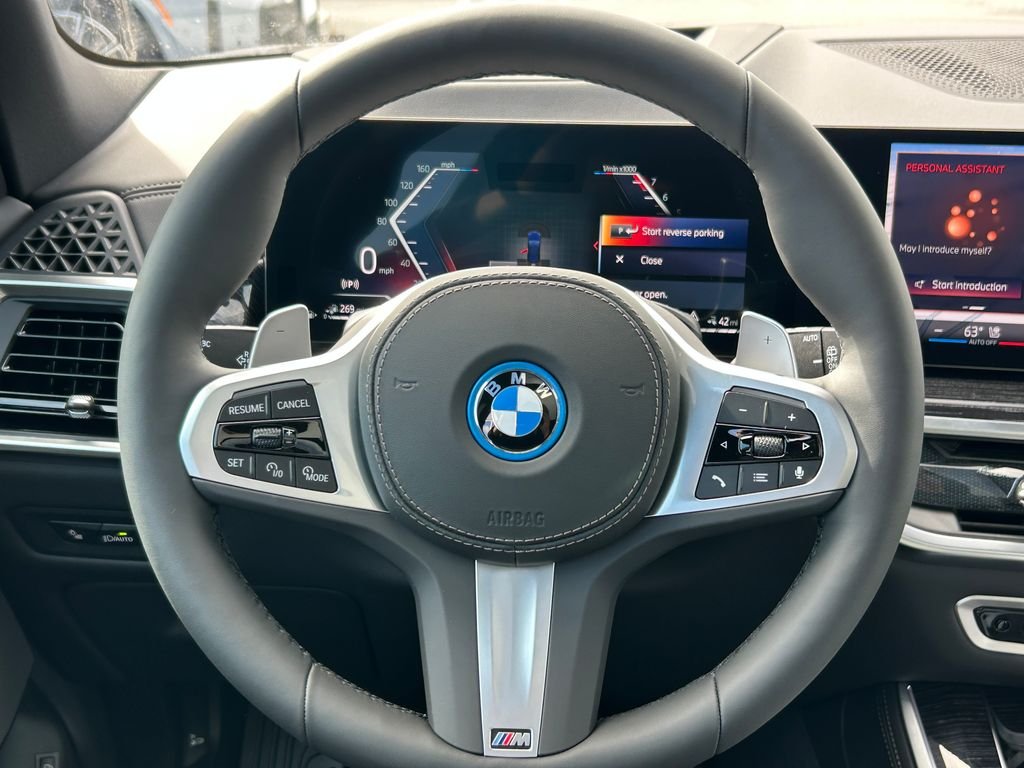 New 2026 Tanzanite Blue II Metallic BMW xDrive50e image 18
