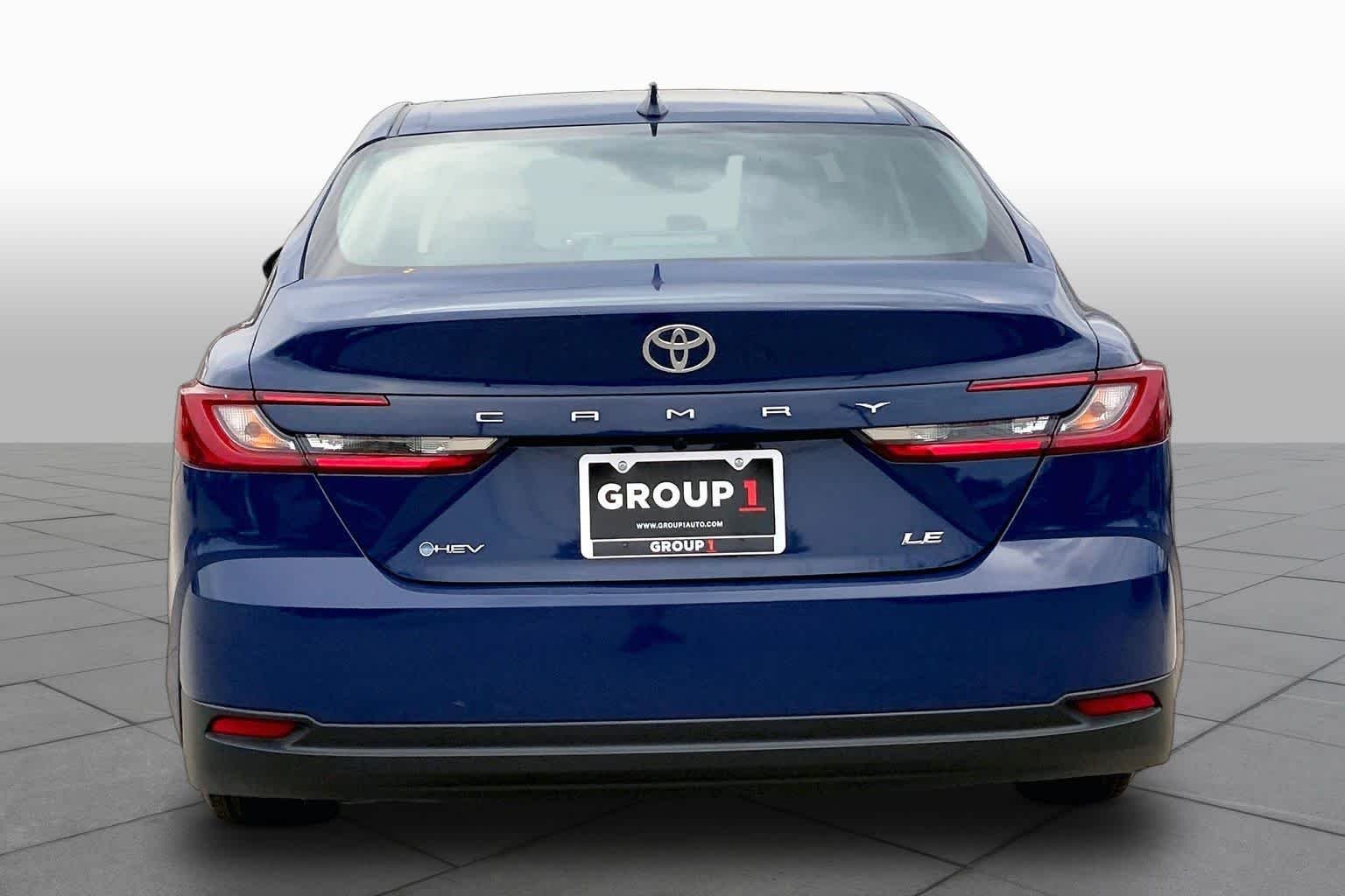 Used 2025 Reservoir Blue Toyota LE image 5