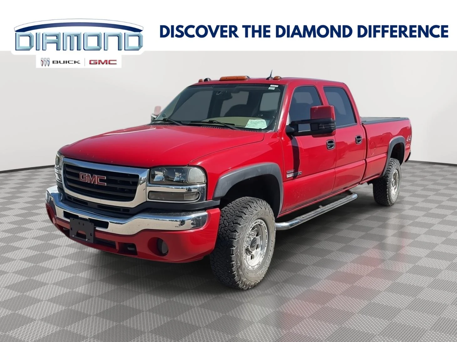 2005 GMC Sierra 4WD Crew Cab SLT's photo