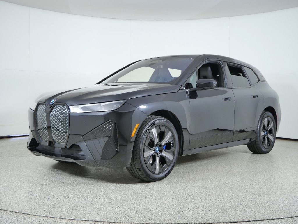 Used 2024 Black BMW xDrive50 image 1